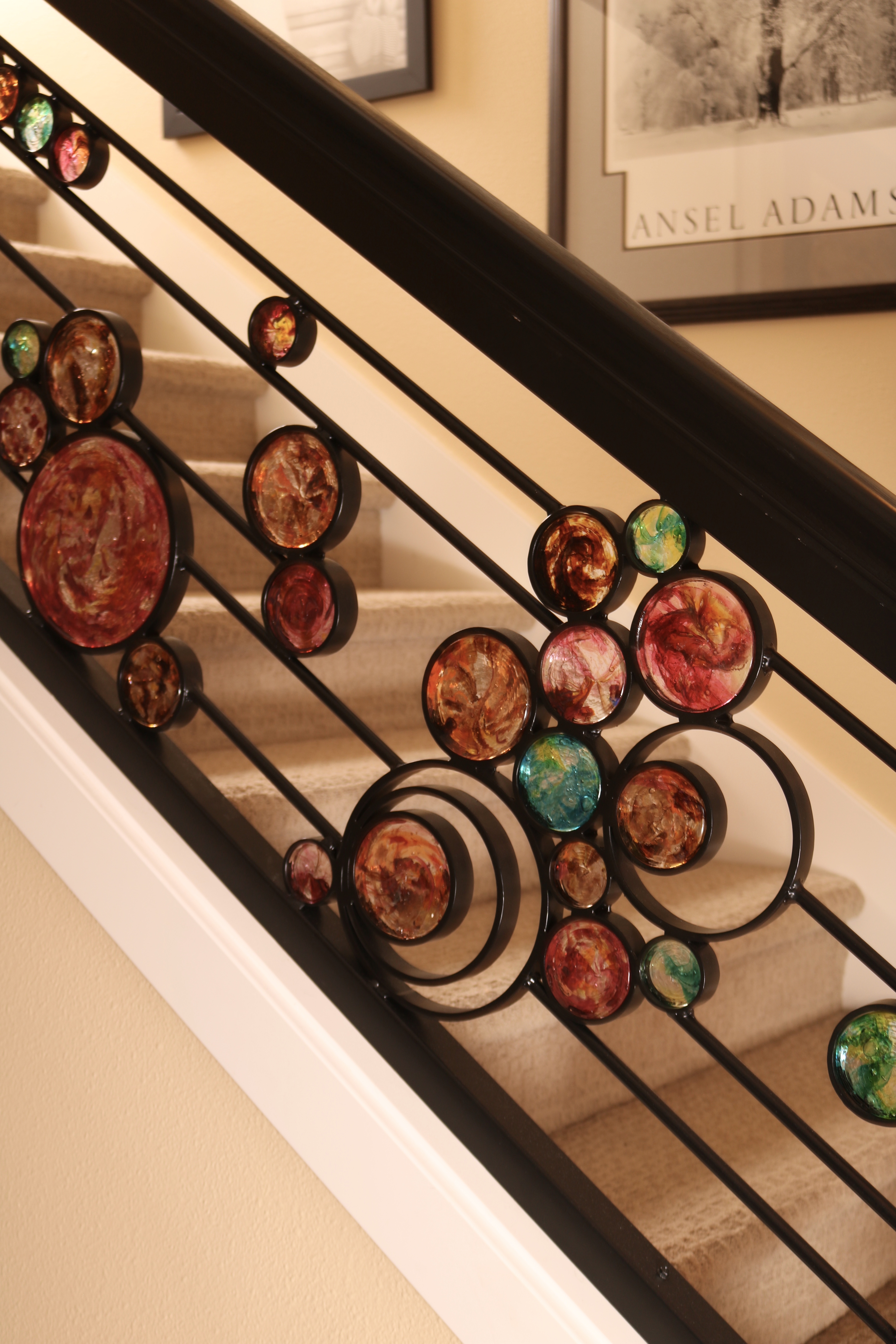 Custom handrail with blown glass inlays